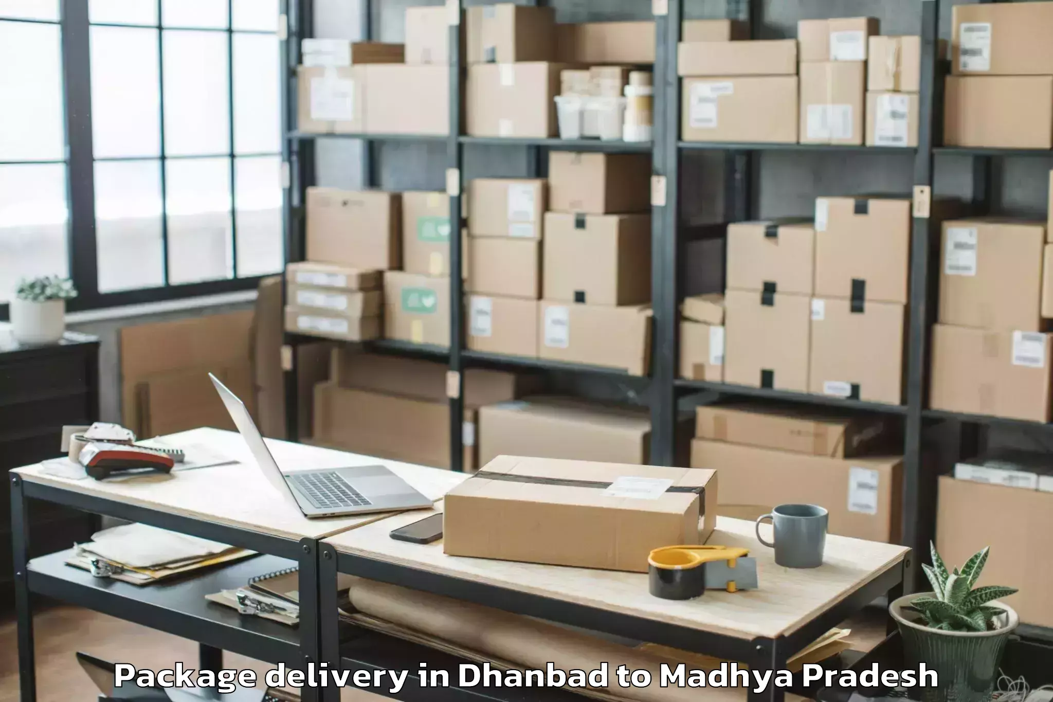 Get Dhanbad to Bhanpur Package Delivery